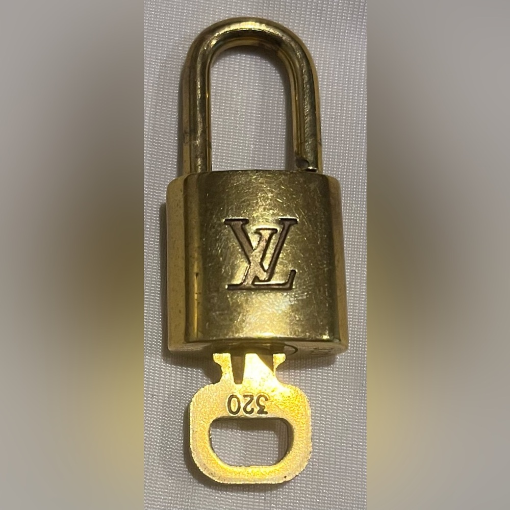 Louis Vuitton padlock and key